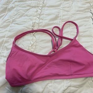 Pink Lululemon sports bra